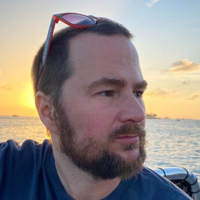 Mike looking sexy in front of a sunset